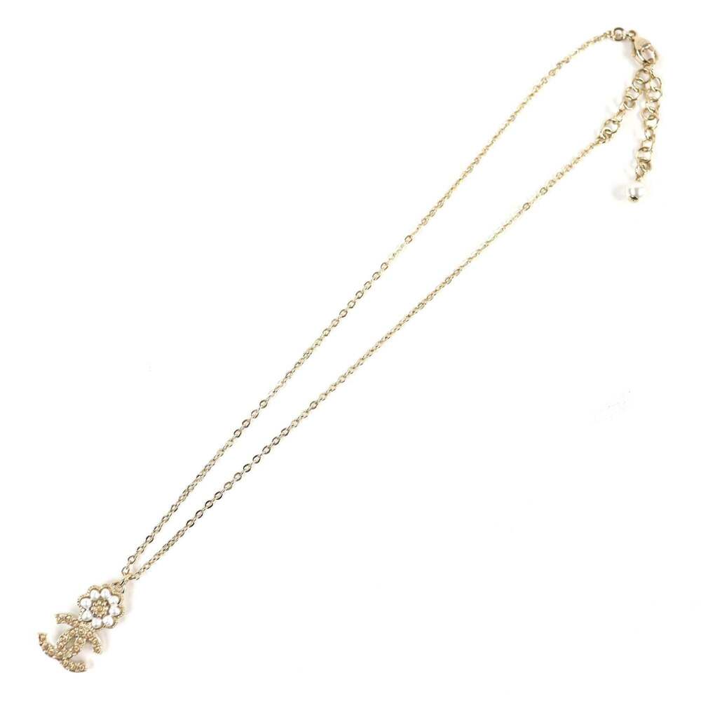 CHANEL Gold Pearl Logo Necklace - Picture 4 of 8